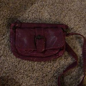 purple leather crossbody purse, no discoloration